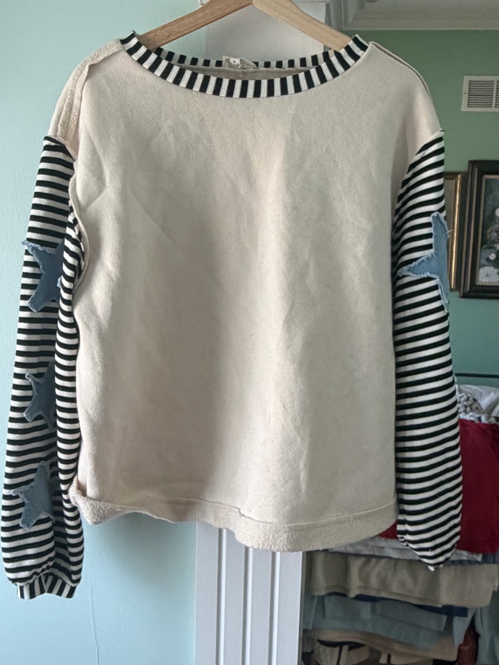 BiBi Cream Pullover with Black-and-White Striped Star Sleeves